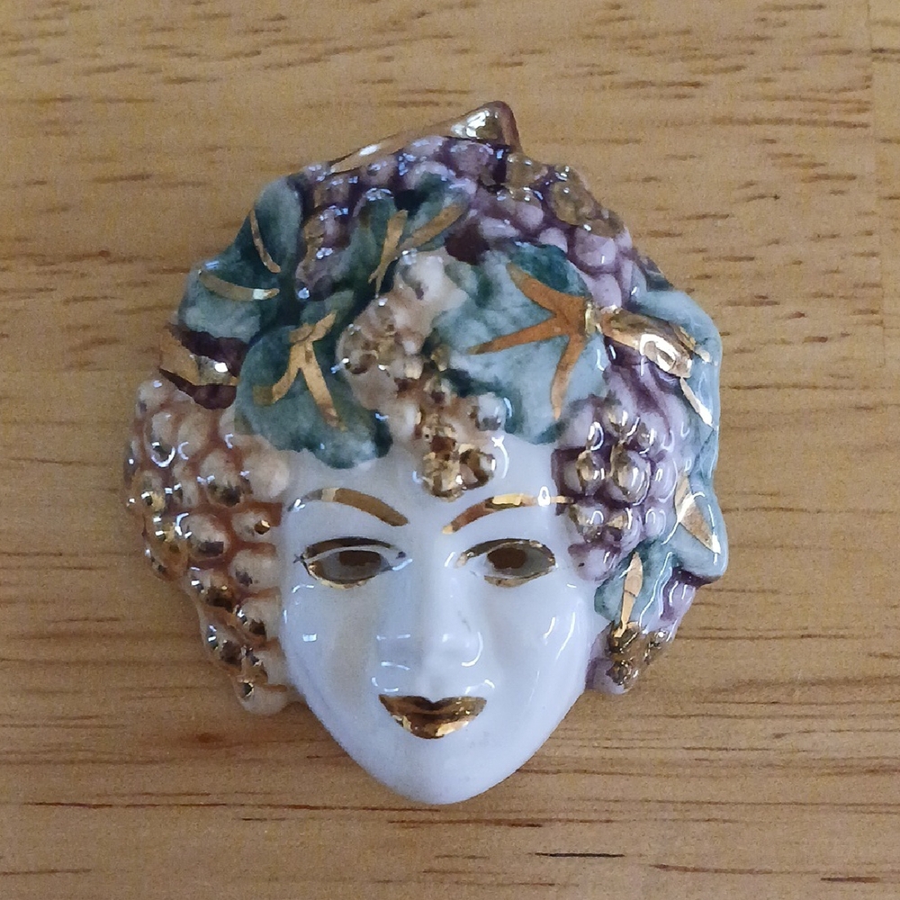 Elegant Porcelain Face Brooch with Gold Accents